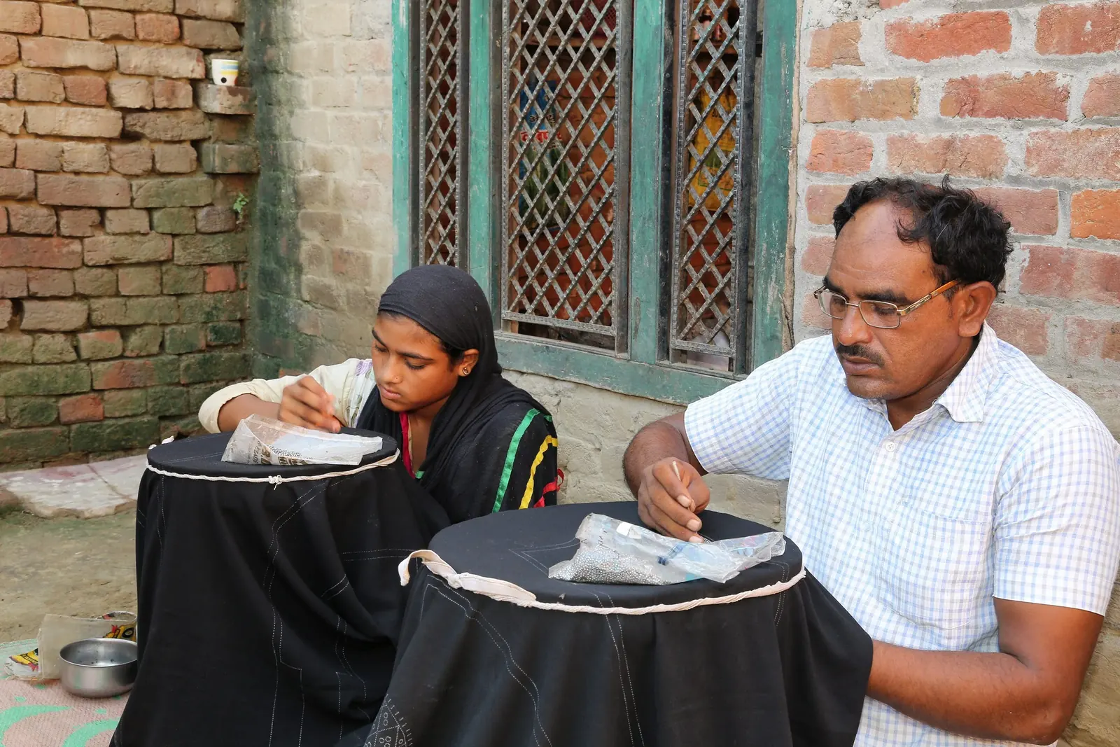 Tri-Impact field team on a community visit to a worker cluster.